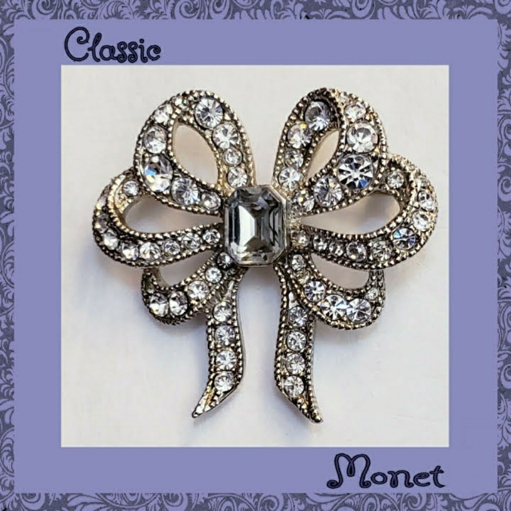 Silver Tone and Rhinestone Bow Brooch by Monet